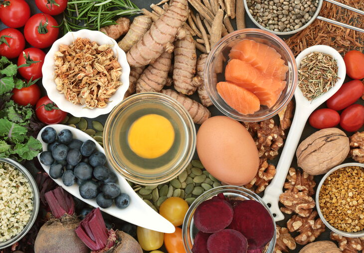 Food to promote brain power and memory concept with nuts, seeds, herbs, vegetables, fruit, dairy and fish. Super foods high in vitamins, antioxidants, omega 3 fatty acids